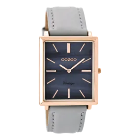 Rose gold coloured  watch with light grey leather strap